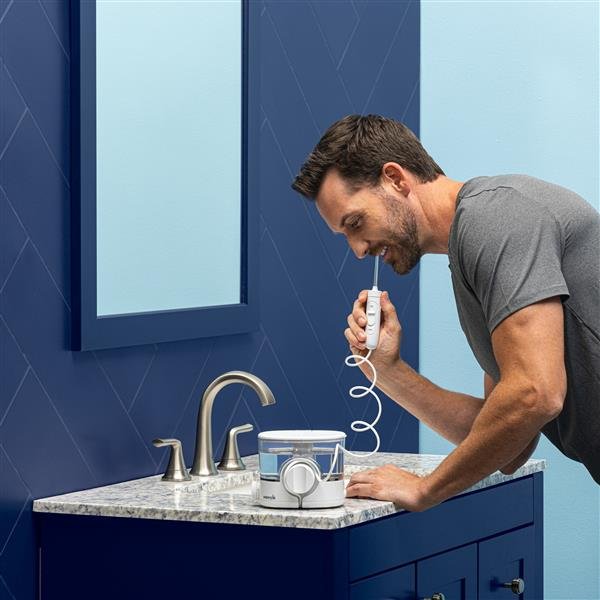 Waterpik ION WF-31 usado junto al lavabo