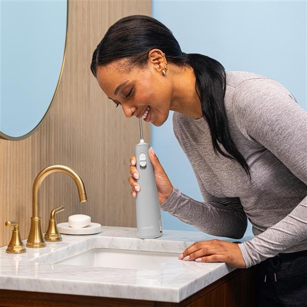 Waterpik WF-35 usado junto al lavabo