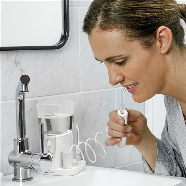 Cómo limpiar y descalcificar un irrigador dental · detalle